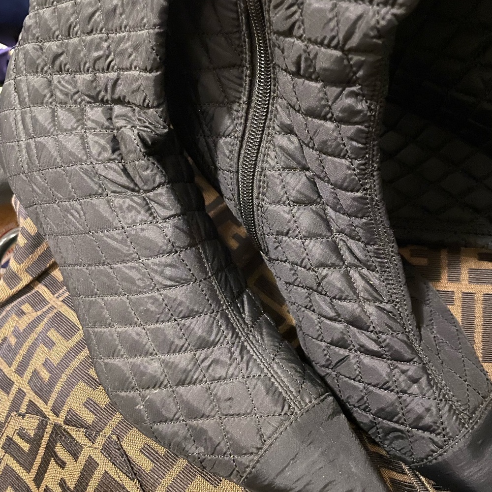 Black up to knee , heeled quilted boots